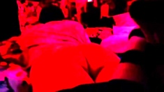 Booty Show Under Red Neon Lights