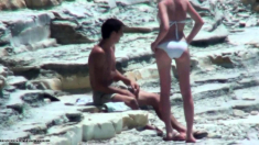 Voyeur Girl Jerks Off dick her boyfriend at a public beach