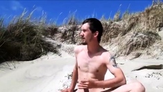 Exhibtionist jerking at the beach again