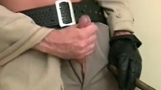 Horny cop puts his muscled body on display and pleases his long cock
